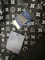 Louis Vuitton monogram jacket fabric with brand tag and size label