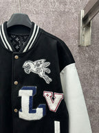 Black varsity jacket front detail with winged horse crest and LV letter patch