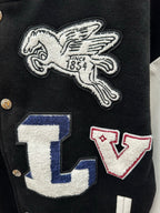 Embroidered winged horse and LV letter patches on black varsity jacket front