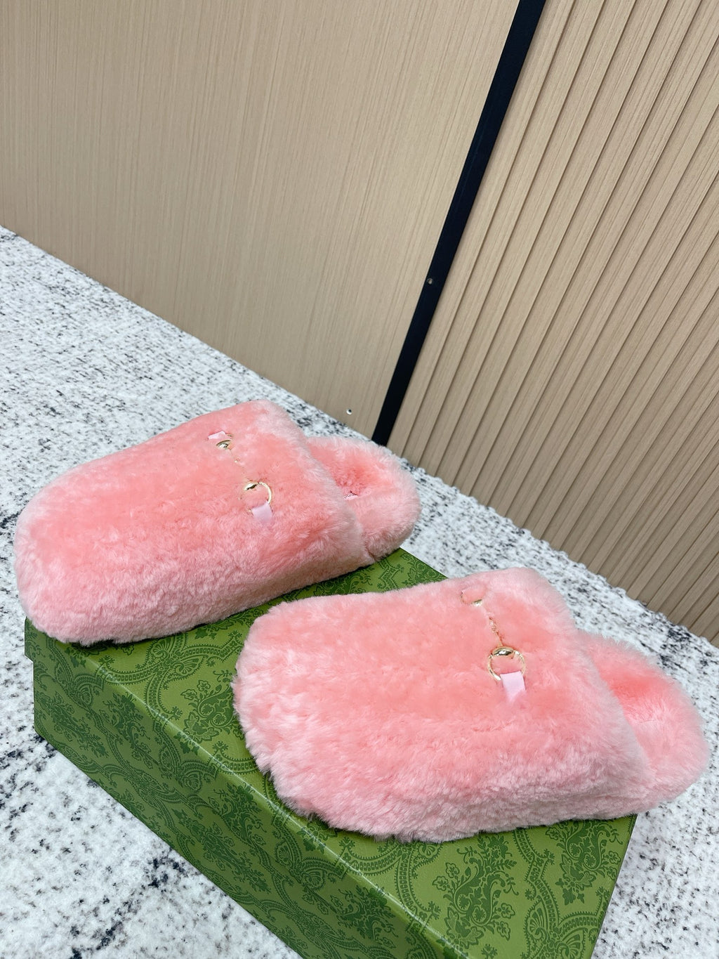 Gucci pink plush slide sandals, two wide fur-like straps with gold-tone buckles