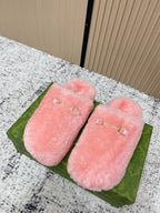Gucci pink plush slide sandals with gold-tone hardware and two wide straps