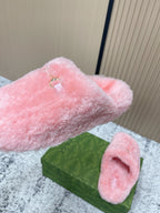 Gucci pink plush slide sandals with one strap detail featuring gold-tone hardware
