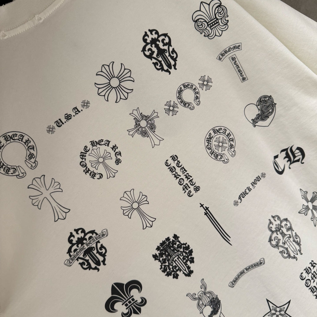 White T-shirt fabric with printed icons pattern, crewneck edge visible