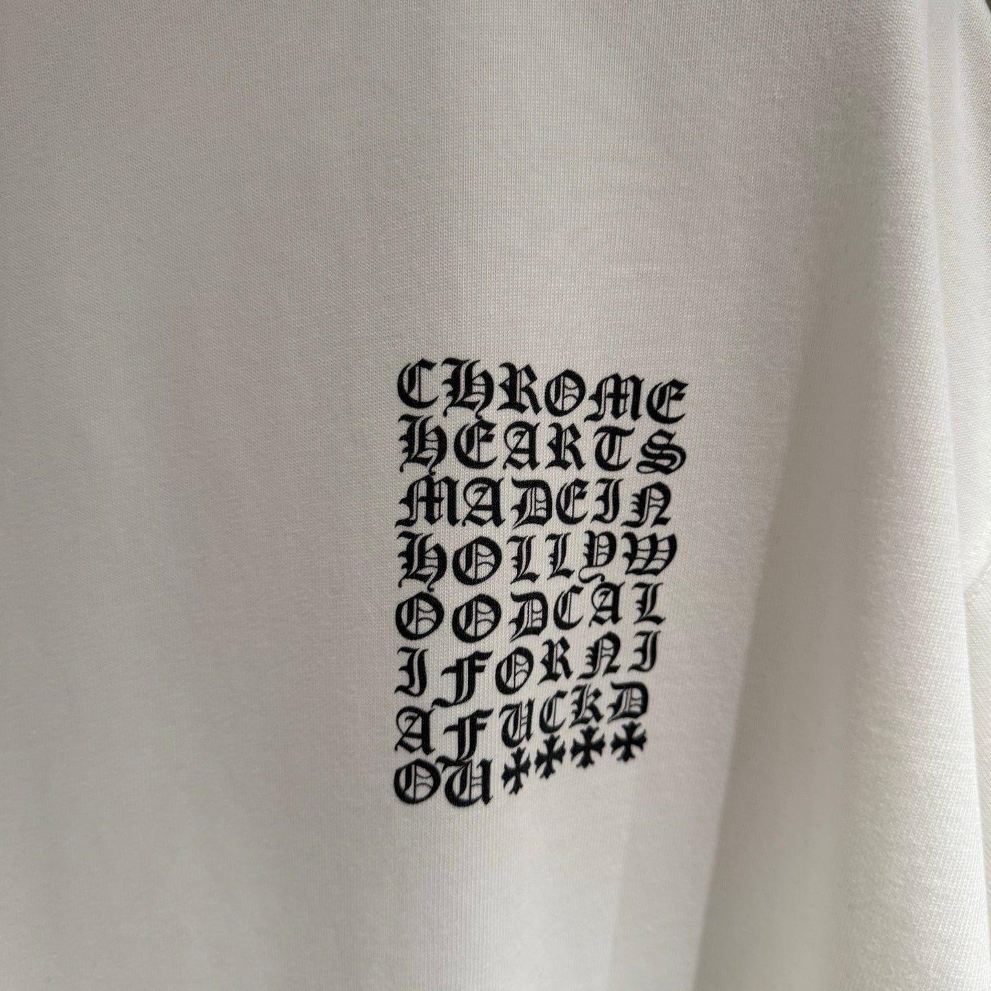 Close-up of white T-shirt chest graphic in black lettering