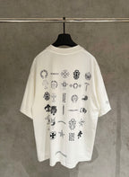 White short-sleeve T-shirt with all-over crest and emblem graphic print