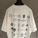 White short-sleeve T-shirt with back collage of icons and text print