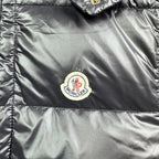Moncler logo patch on dark satin puffer vest front panel