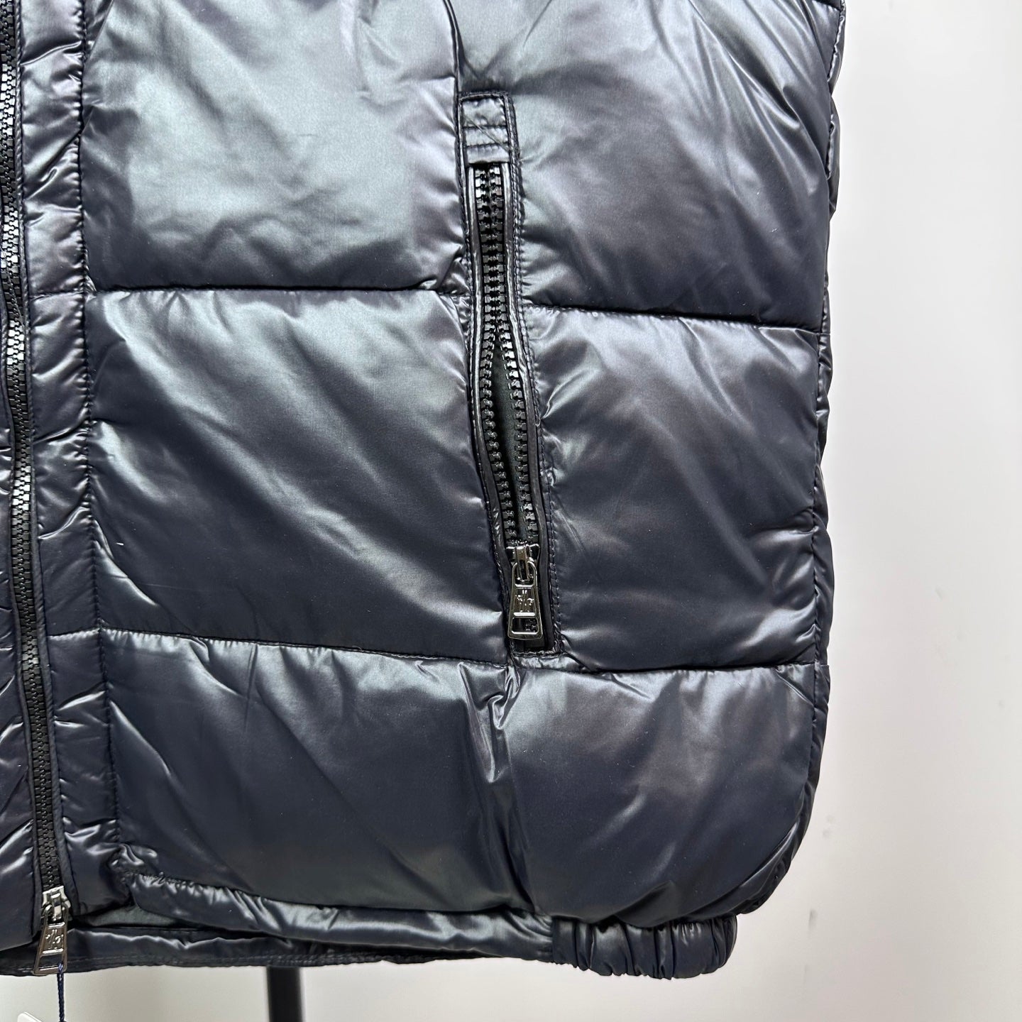 Moncler dark navy quilted puffer vest with center front zipper and pockets