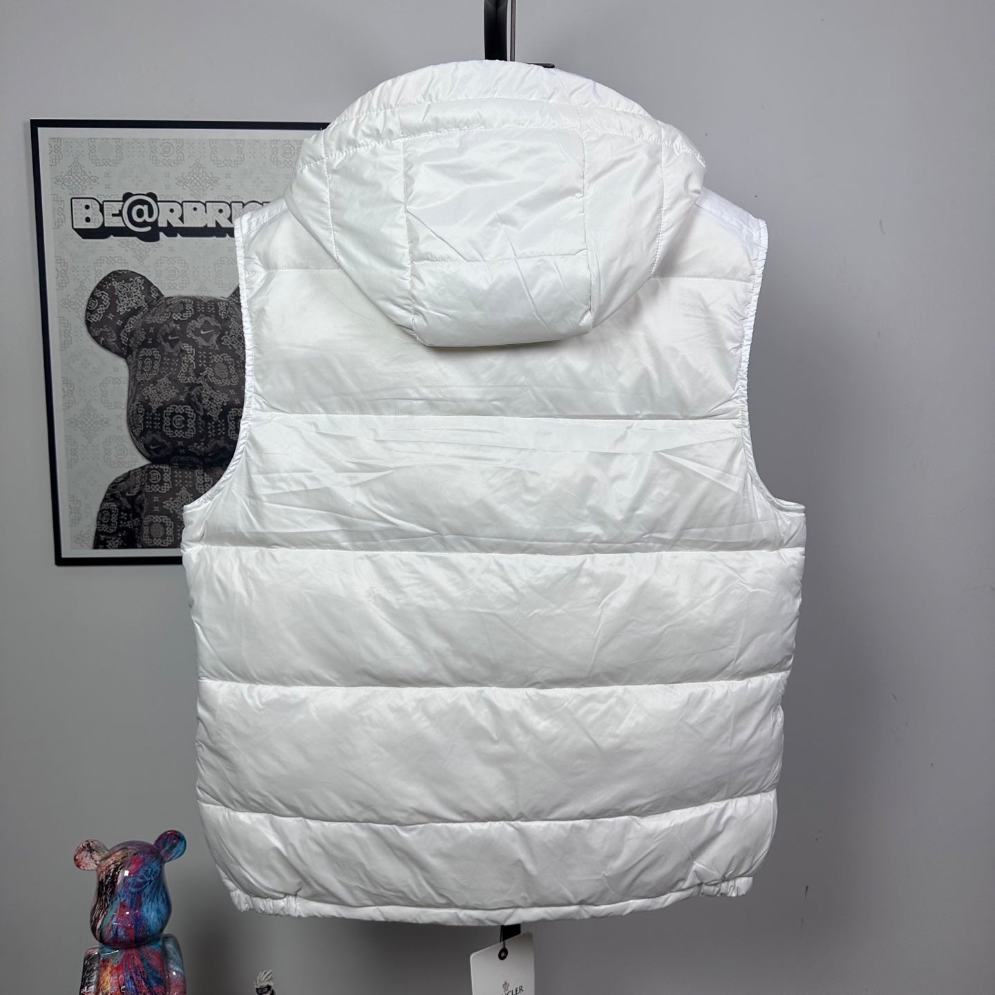 Moncler hooded puffer vest, white, back view with hood