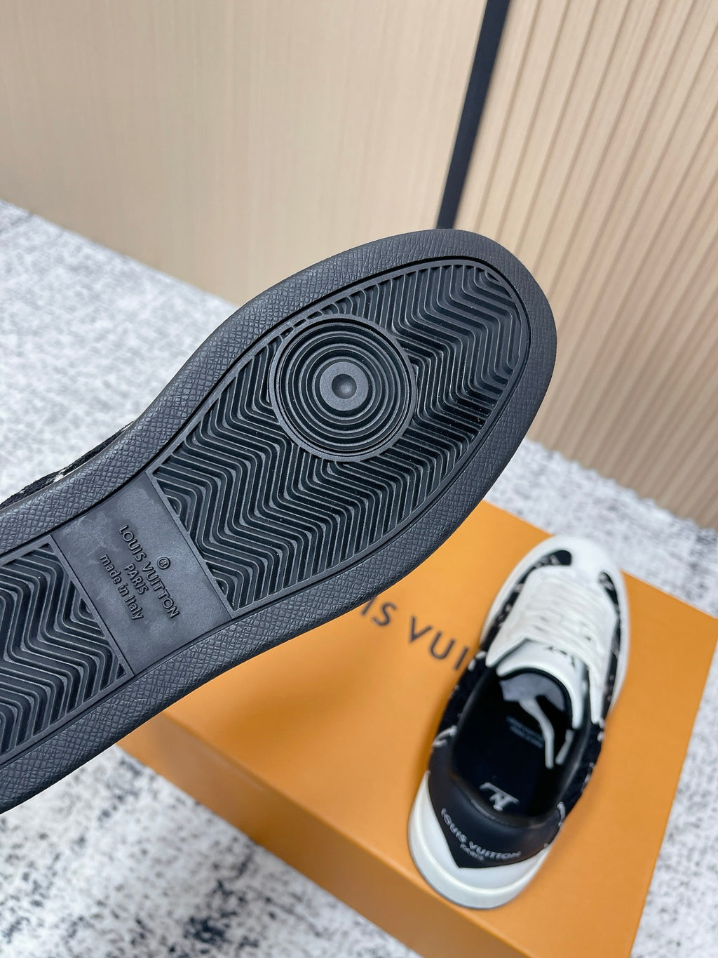 Louis Vuitton unisex sneakers, outsole tread view with dark rubber sole