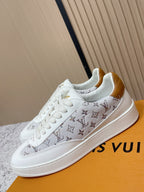 Louis Vuitton unisex sneakers, white monogram stripe with gold accent at heel and side sole