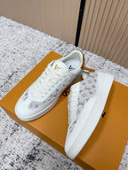 Louis Vuitton unisex sneakers, white with monogram print, side zipper and gold logo accents