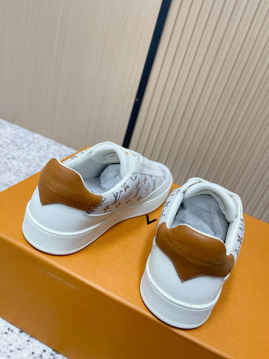 Louis Vuitton unisex sneakers, white upper with gold heel tab and monogram side panel