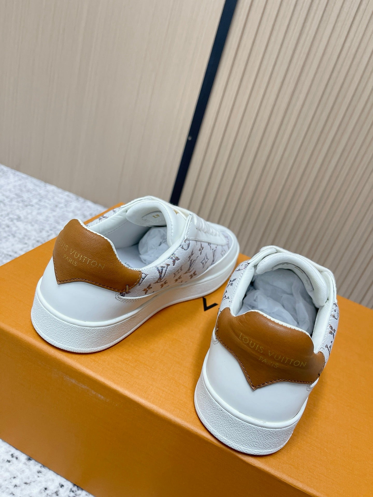 Louis Vuitton unisex sneakers, white upper with gold heel tab and monogram side panel