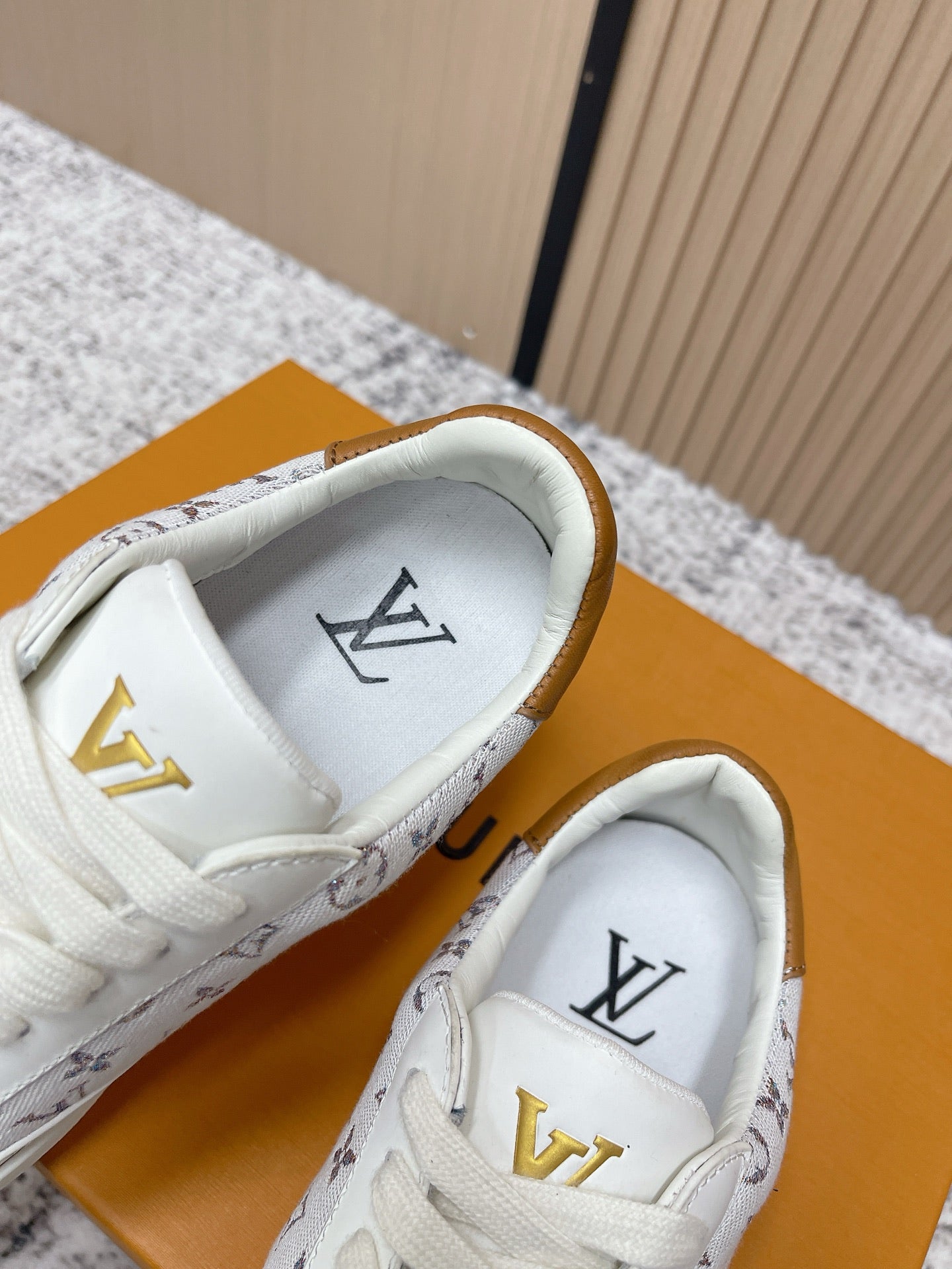 Louis Vuitton unisex sneakers, white interior lining with gold LV logo patch and lace tongue