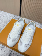 Louis Vuitton unisex sneakers, white leather with monogram pattern and gold logo accents