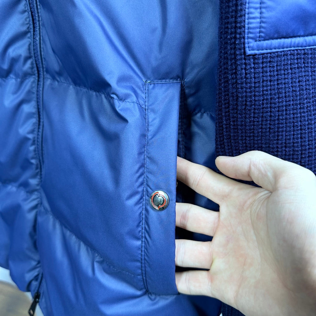 Blue Moncler padded jacket front with snap placket and quilted panels