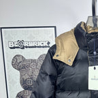 Long Moncler puffer jacket with beige hood panel and dark navy front