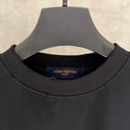 Black T-shirt neckline with Louis Vuitton Paris inner brand label