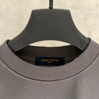 Louis Vuitton T-shirt collar, dark gray knit with neck label on hanger