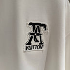 White T-shirt with embroidered black Louis Vuitton logo patch on chest