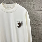 Men's Burberry white crewneck sweatshirt, close-up chest logo and ribbed collar