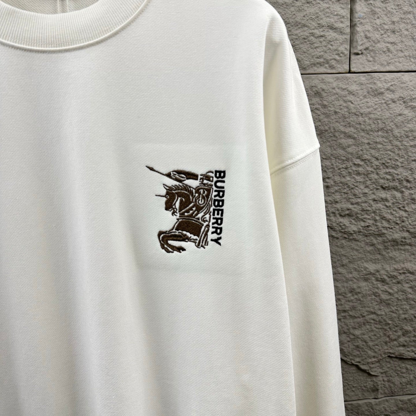 Men's Burberry white sweatshirt, close-up right-chest embroidered logo