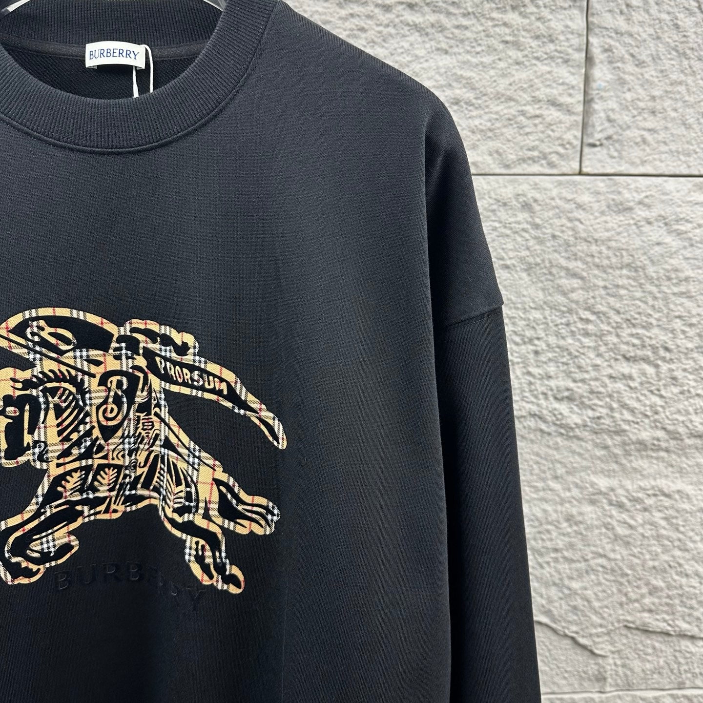 Burberry sweatshirt side view with front polo rider artwork