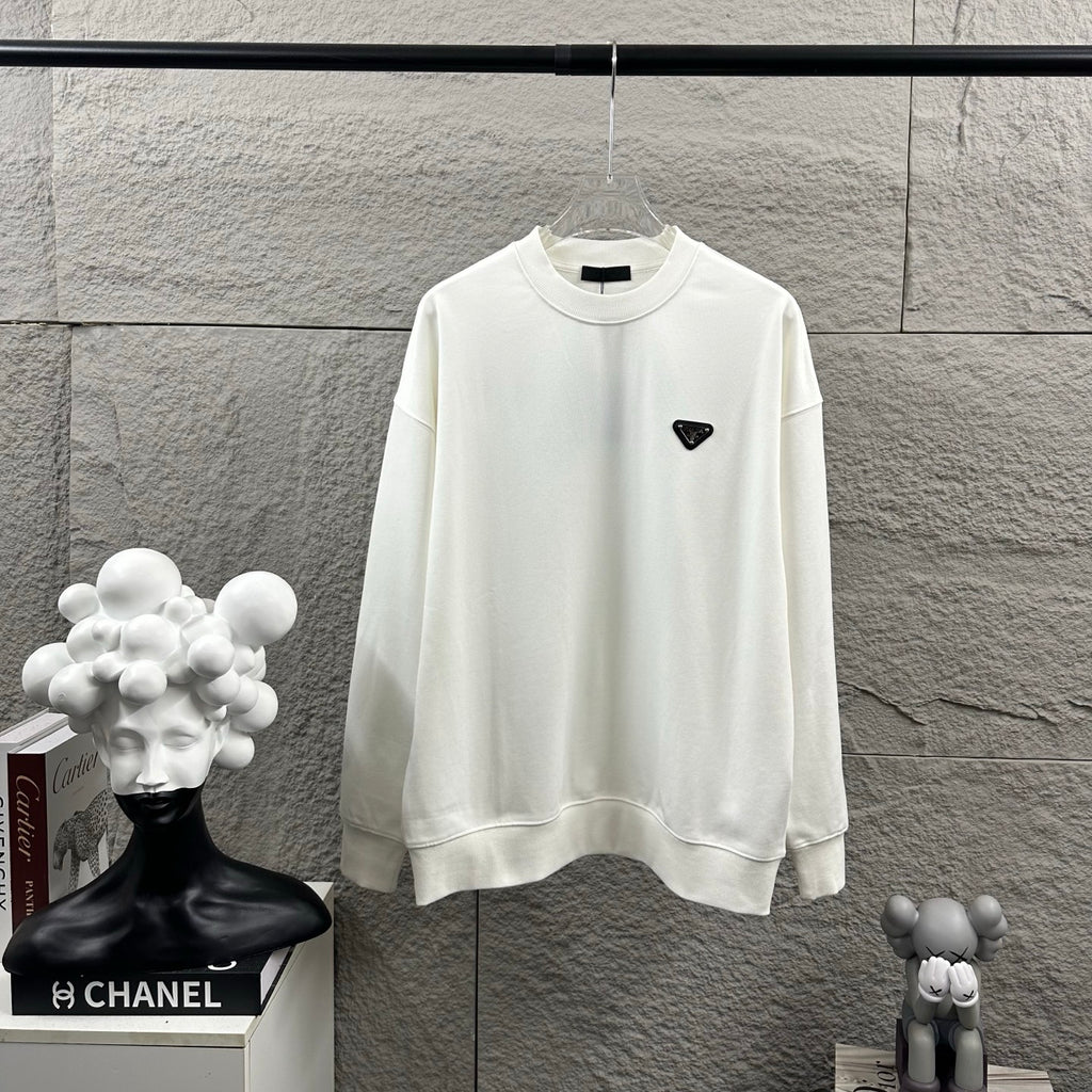 Off-white Prada long-sleeve sweatshirt with black triangular logo patch at chest.