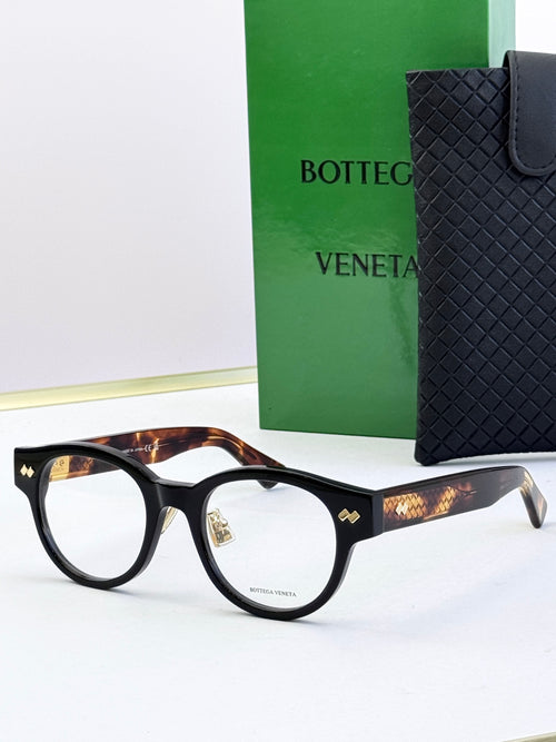 Bottega Veneta black round eyeglasses with tortoise-pattern temples and metal hinges