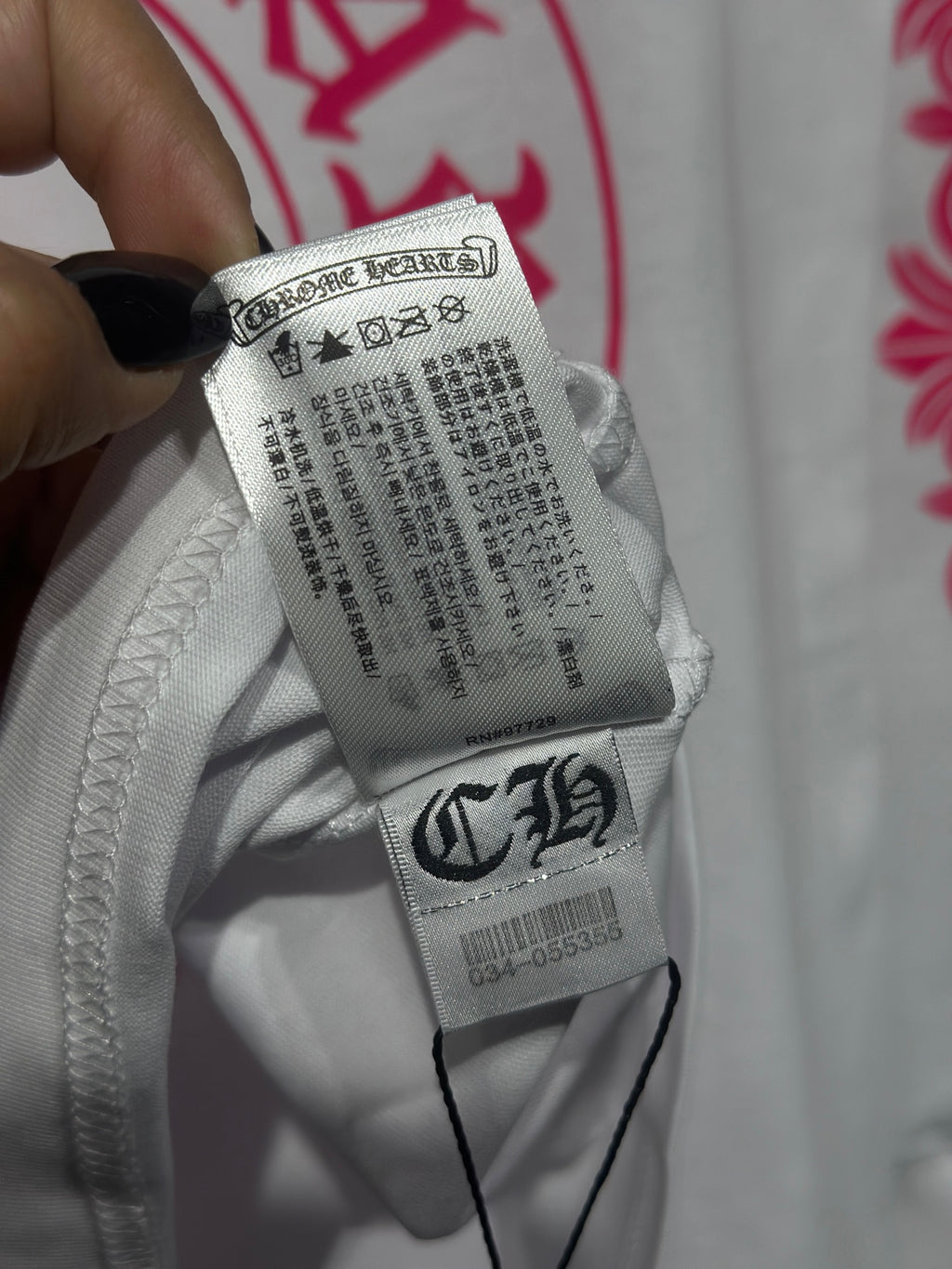 White long-sleeve shirt inner label and size details