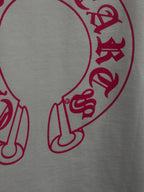 White long-sleeve shirt with red character graphic print
