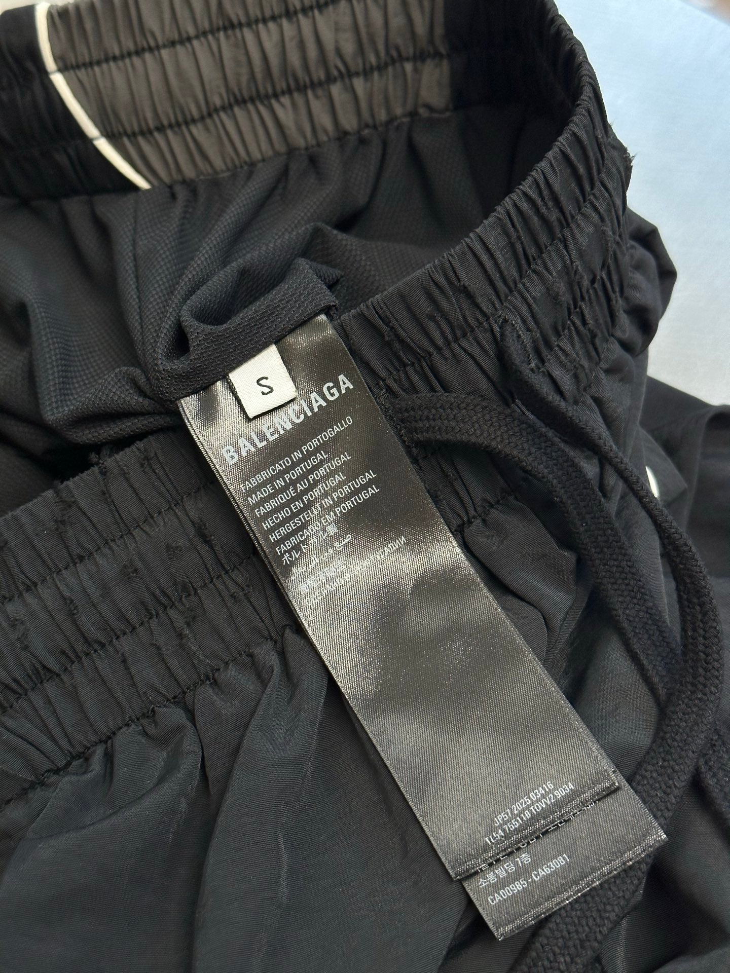 Dark navy pants with drawstring and interior size label marked S