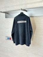 Balenciaga long-sleeve top, dark navy back with large white logo print