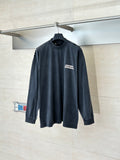Balenciaga long-sleeve top, dark navy crew neck with small chest logo patch