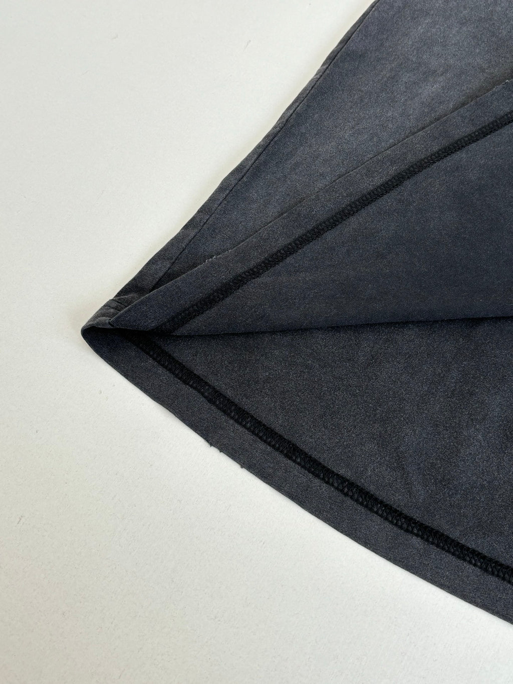 Balenciaga long-sleeve top sleeve detail, dark navy with stitched seam