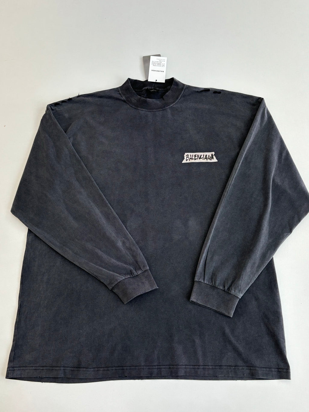 Balenciaga long-sleeve top, dark navy crew neck with small chest logo