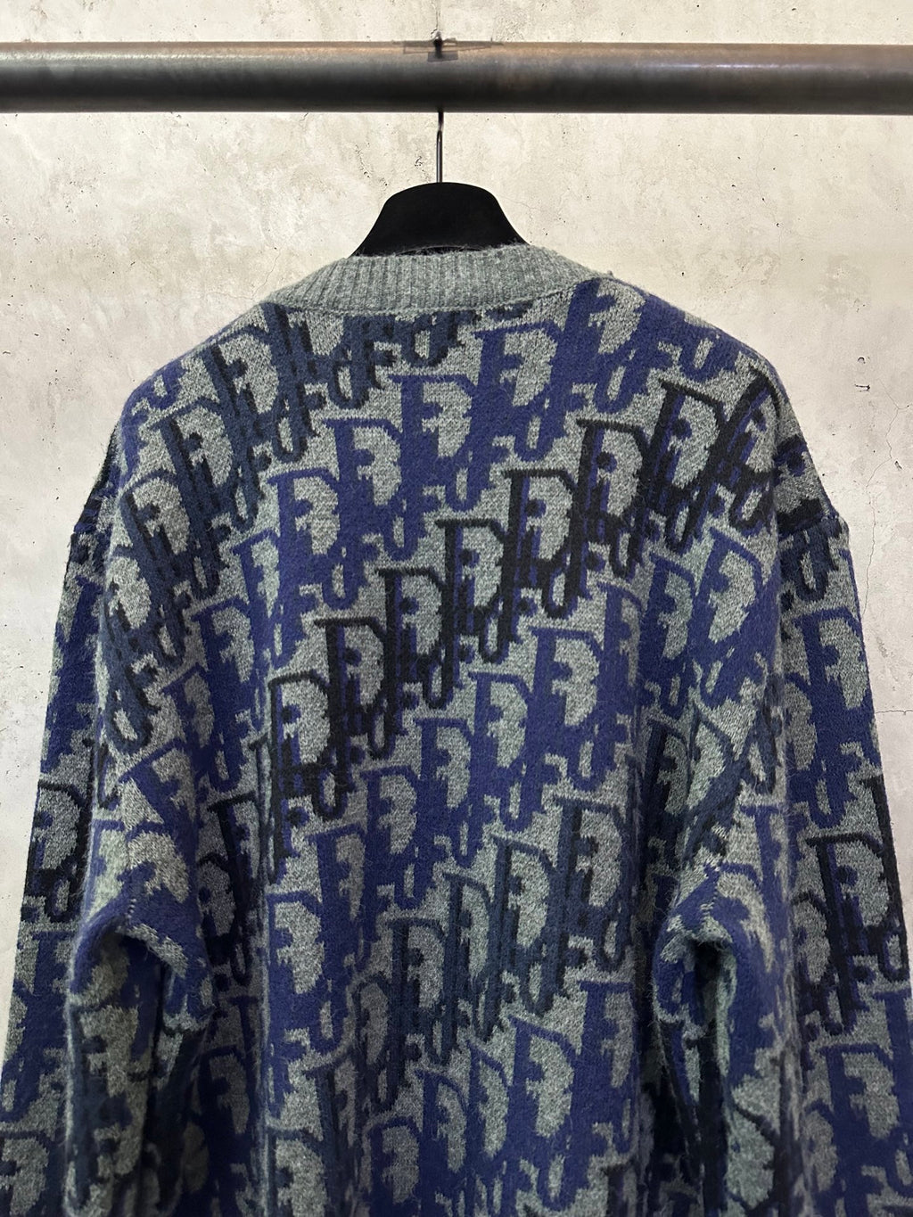Dior long-sleeve knit sweater back view with blue and black allover logo pattern