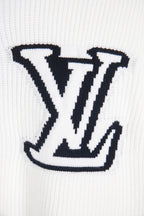 White knit sweater with oversized navy LV logo close-up
