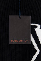 Dark navy sweater fabric with Louis Vuitton hang tag