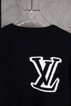 Dark navy sweater back with centered white LV logo