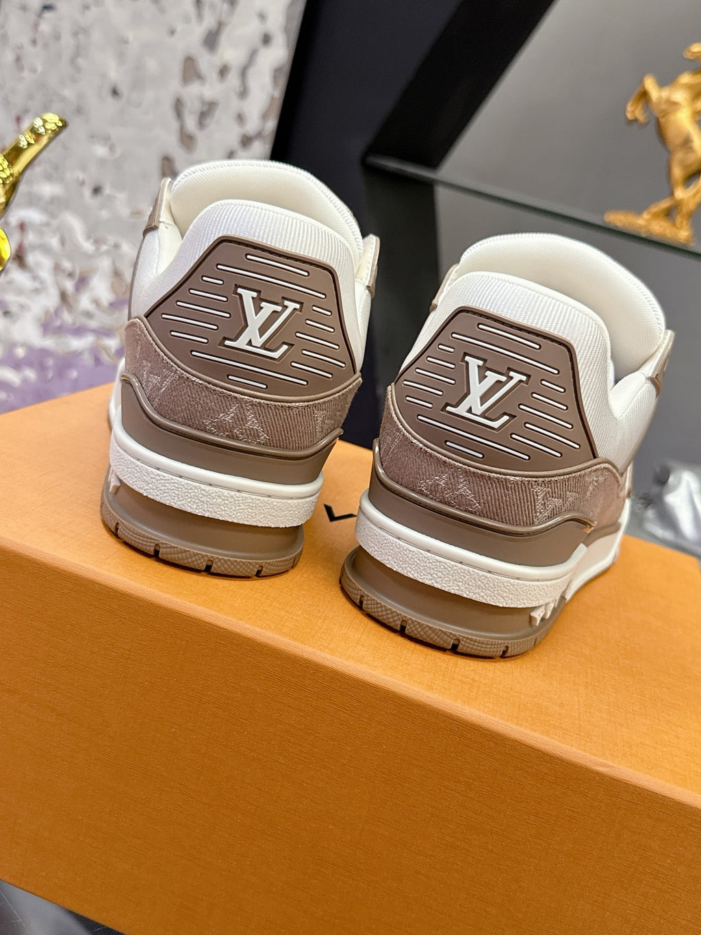 Ladies Louis Vuitton sneakers heel backs, white uppers with brown logo panels