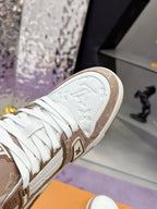Ladies Louis Vuitton sneaker toe, white canvas with brown trim and monogram