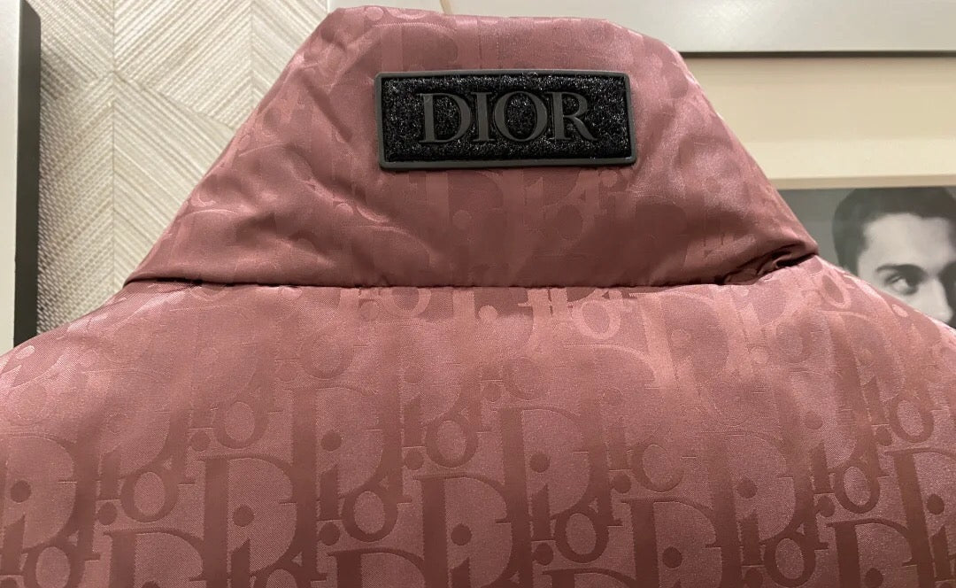 Dior monogram hood with DIOR logo patch on maroon padded puffer vest
