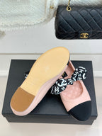 Chanel logo bow ballet flat in blush pink with black toe panel and outsole