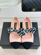 Chanel logo bow ballet flats, blush pink with black toe panels and bows