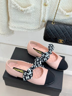 Chanel logo bow ballet flats on box: blush pink with black front and heels