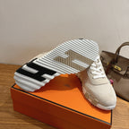 Hermes unisex sneakers, off-white soles with striped tread pattern