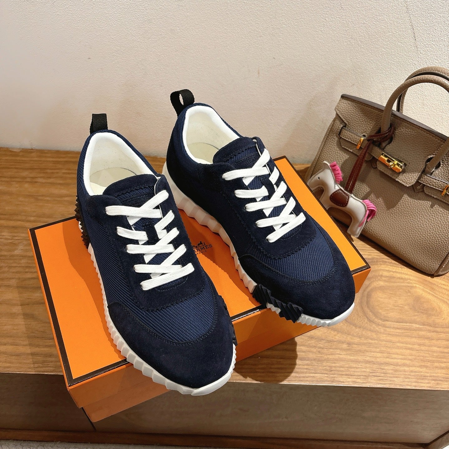 Hermes unisex sneakers, navy upper with white laces and white cushioned sole