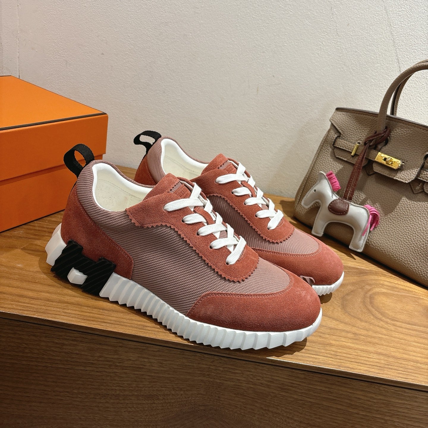 Unisex Hermes sneakers side view, brown suede and gray knit, white laces, chunky white sole